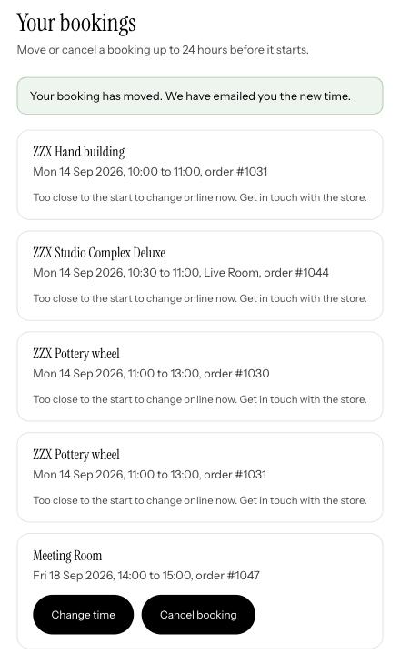 The Your bookings page on a store: a green notice says the booking has moved, and each booking is a card with Change time and Cancel booking buttons