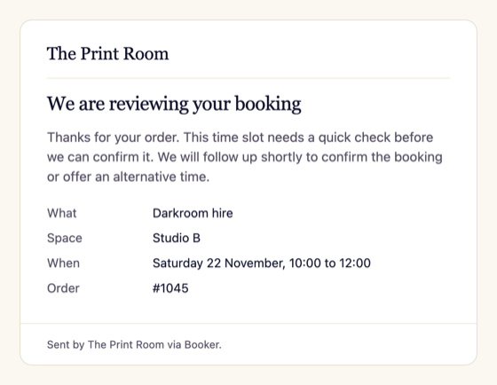 Booking under review email for a clashing time